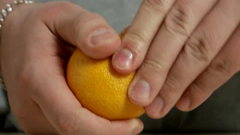 Mandarin in hand Stock Footage 170019031