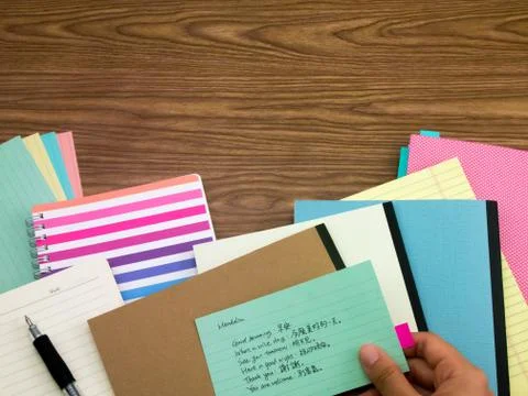Mandarin; Learning New Language Writing Words on the Notebook Stock Photos