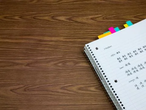 Mandarin; Learning New Language Writing Words on the Notebook Stock Photos