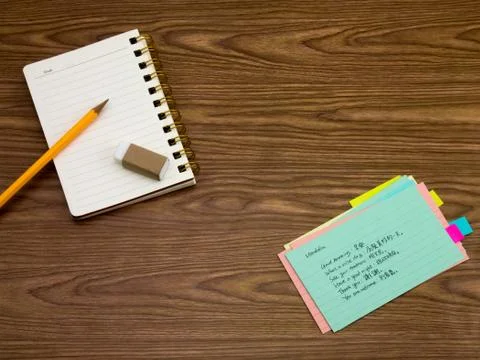 Mandarin; Learning New Language Writing Words on the Notebook Stock Photos
