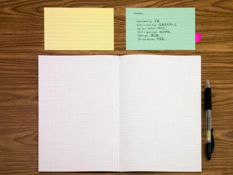 Mandarin; Learning New Language Writing Words on the Notebook Stock Photos