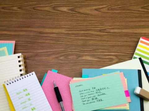 Mandarin; Learning New Language Writing Words on the Notebook Stock Photos