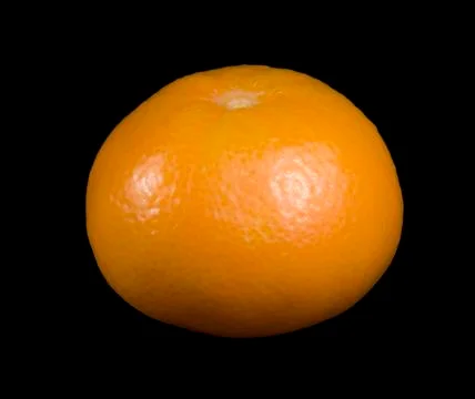 Mandarin orange in black back Stock Photos