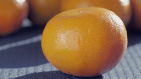 Mandarin Orange Falls in Slow Motion Stock Footage 71819160