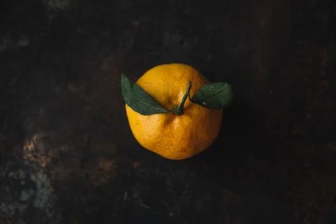 Mandarin orange on rustic background Stock Photos