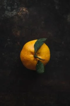 Mandarin orange on rustic background Stock Photos