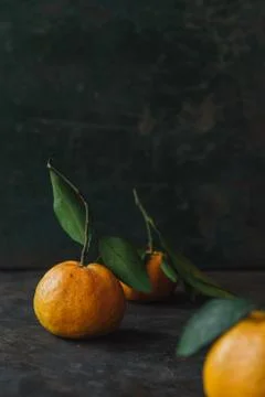 Mandarin orange on rustic background Stock Photos