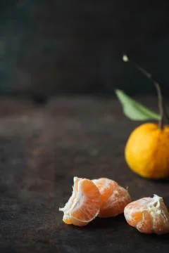 Mandarin orange on rustic background Stock Photos