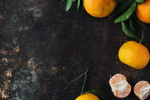 Mandarin orange on rustic background Stock Photos