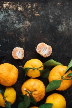 Mandarin orange on rustic background Stock Photos