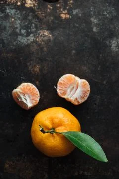 Mandarin orange on rustic background Stock Photos