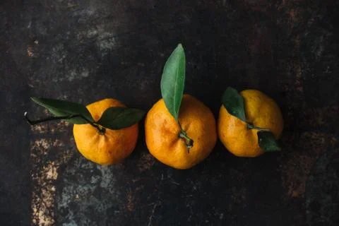 Mandarin orange on rustic background Foto stock