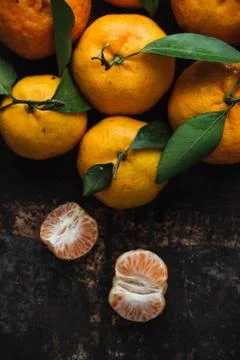 Mandarin orange on rustic background Stock Photos