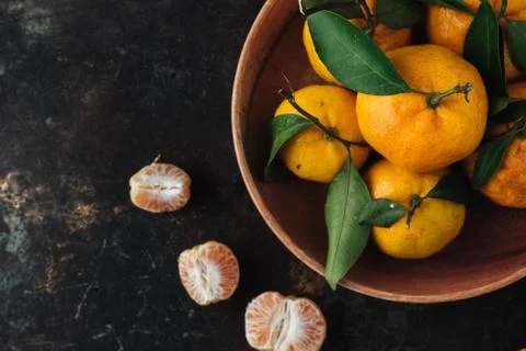 Mandarin orange on rustic background Stock Photos