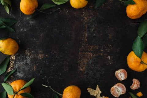 Mandarin orange on rustic background Stock Photos