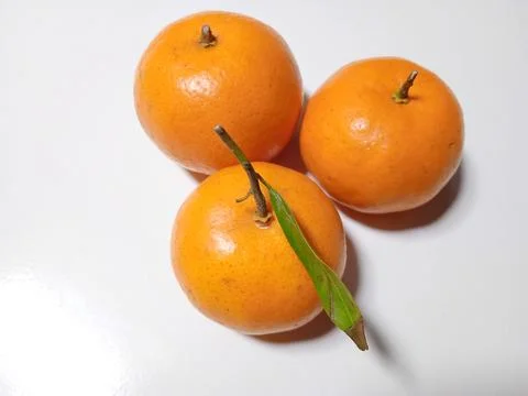 Mandarin oranges on a white background Stock Photos