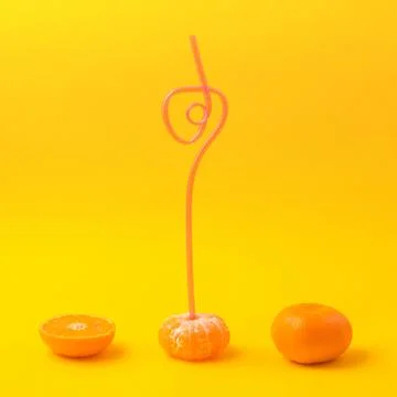 Mandarin with straws Stock Photos