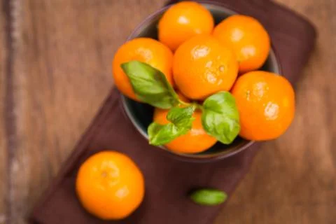Mandarine with basil Foto stock