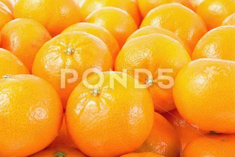 Mandarines background. Stock Photos