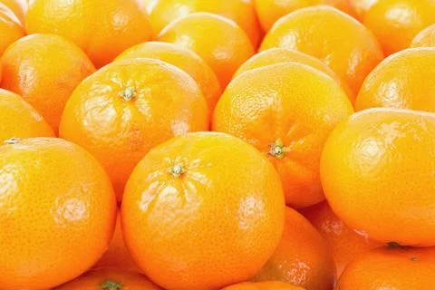 Mandarines background. Stock Photos