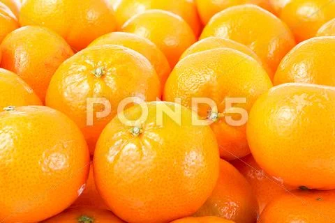 Mandarines background. Stock Photos