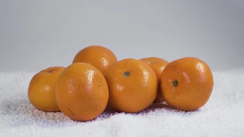 Mandarins are on the white background Stock Footage 127857605