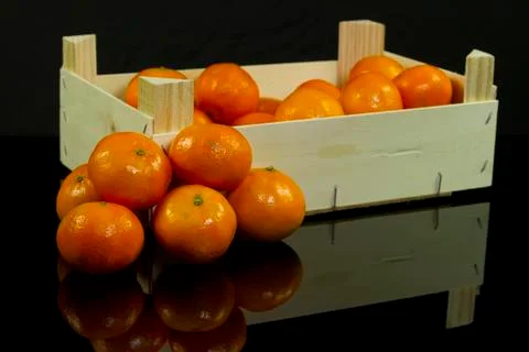 Mandarins in crate Stock Photos