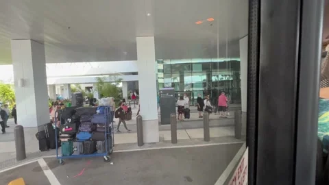 Mandatory pre-cruise covid test line at Miami port new Cruise Terminal NCL Stock Footage 167740997
