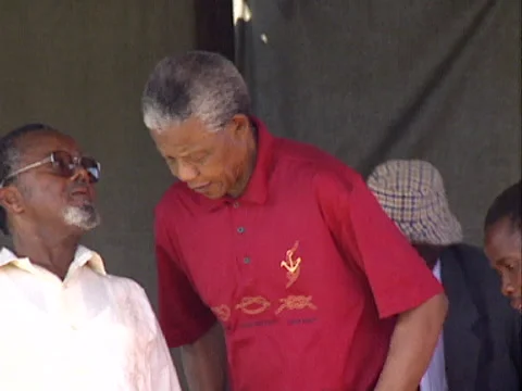 Mandela sits on the stage Stock Footage 134276837