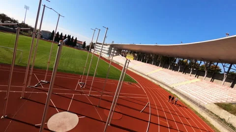 Maneuverable FPV drone flight over stadium. Contemporary huge soccer field and Stock Footage 167927095