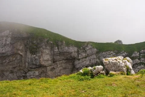 Mangart Saddle in Low Clouds Stock Photos