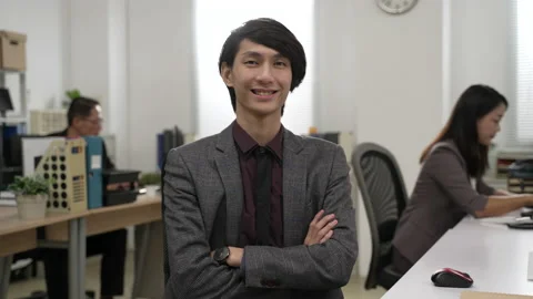 Manger posing with folded arms looking at camera Stock-Footage 211677976
