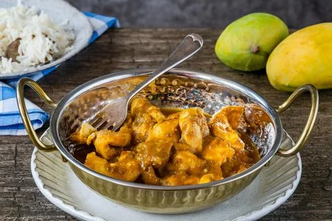 Mango and chicken curry Stock Photos