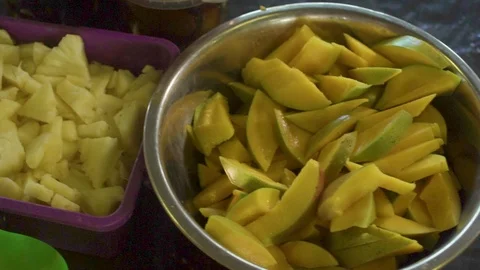 Mango and Pineapple Sliced Stock Footage 106556698