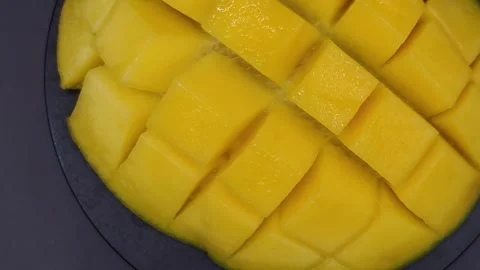Mango appetizing black background top view macro photography Stock Footage 329645886