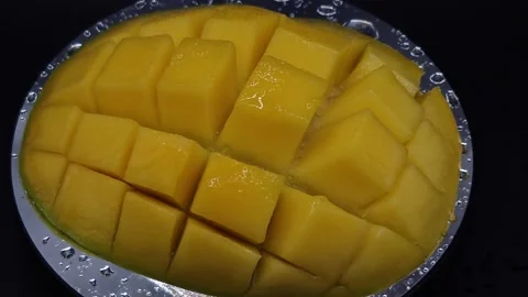 Mango on a black background Stock Footage 329645694