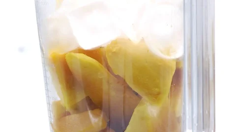 Mango in blender Stock Footage 118115786
