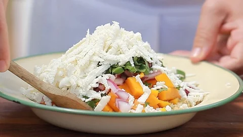 Mango Bulgur fresh feta healthy summer vegetarian vegan vegetable fruits salad Stock Footage 73649896
