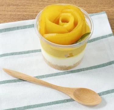 Mango Cheesecake, A Sweet Dessert Consisting of Cream Cheese, Biscuits Crust Stock Photos