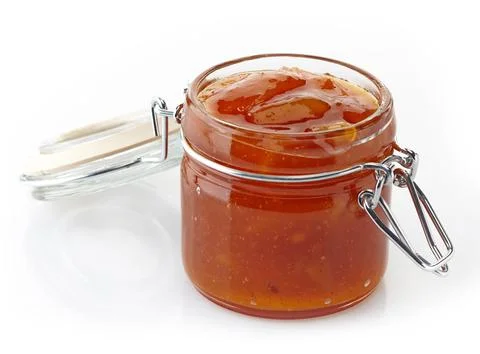 Mango Chutney in a jar on a white background 写真素材
