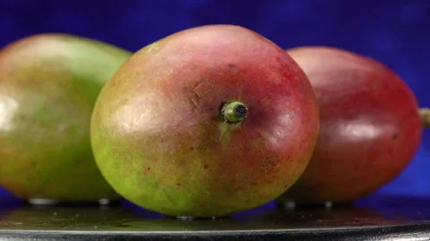 Mango close-up, on a dark background. Stock Footage 154823188