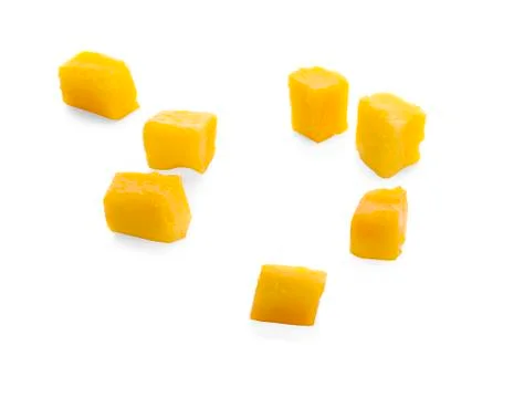 Mango cube slices isolated on the white background Stock Photos