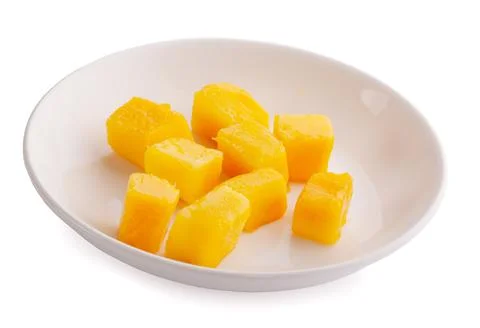 Mango cube slices isolated on the white background Stock Photos