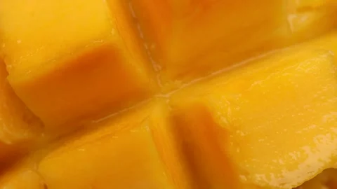 Mango cube slices, rotation in circle. juicy yellow Mango Fruit Turning Stock Footage 269027728