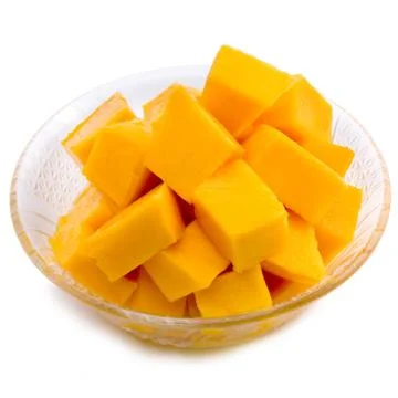 Mango cubes in the dish / slices close up isolated on white / macro Stock Photos