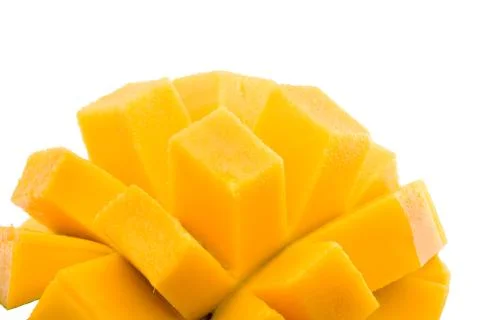 Mango cubes / slices close up isolated on white / macro Foto stock