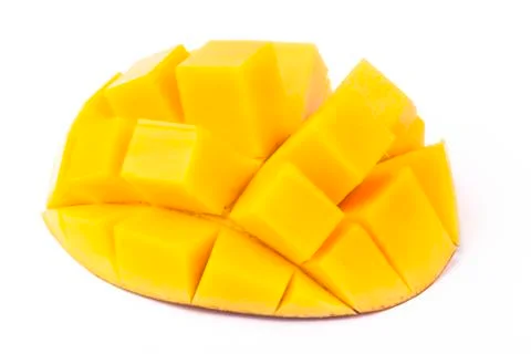 Mango cubes on white Stock Photos