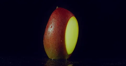 Mango. Cut fruit.  Roundshot circa 360 degrees. Stock Footage 221183223