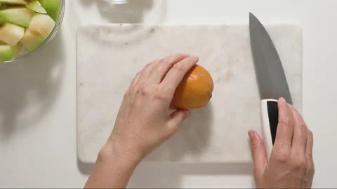 Mango cuts. Fruit salad recipe, part of series. Stock Footage 136716644