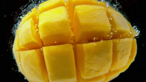 Mango falling into water Stock Footage 172094527